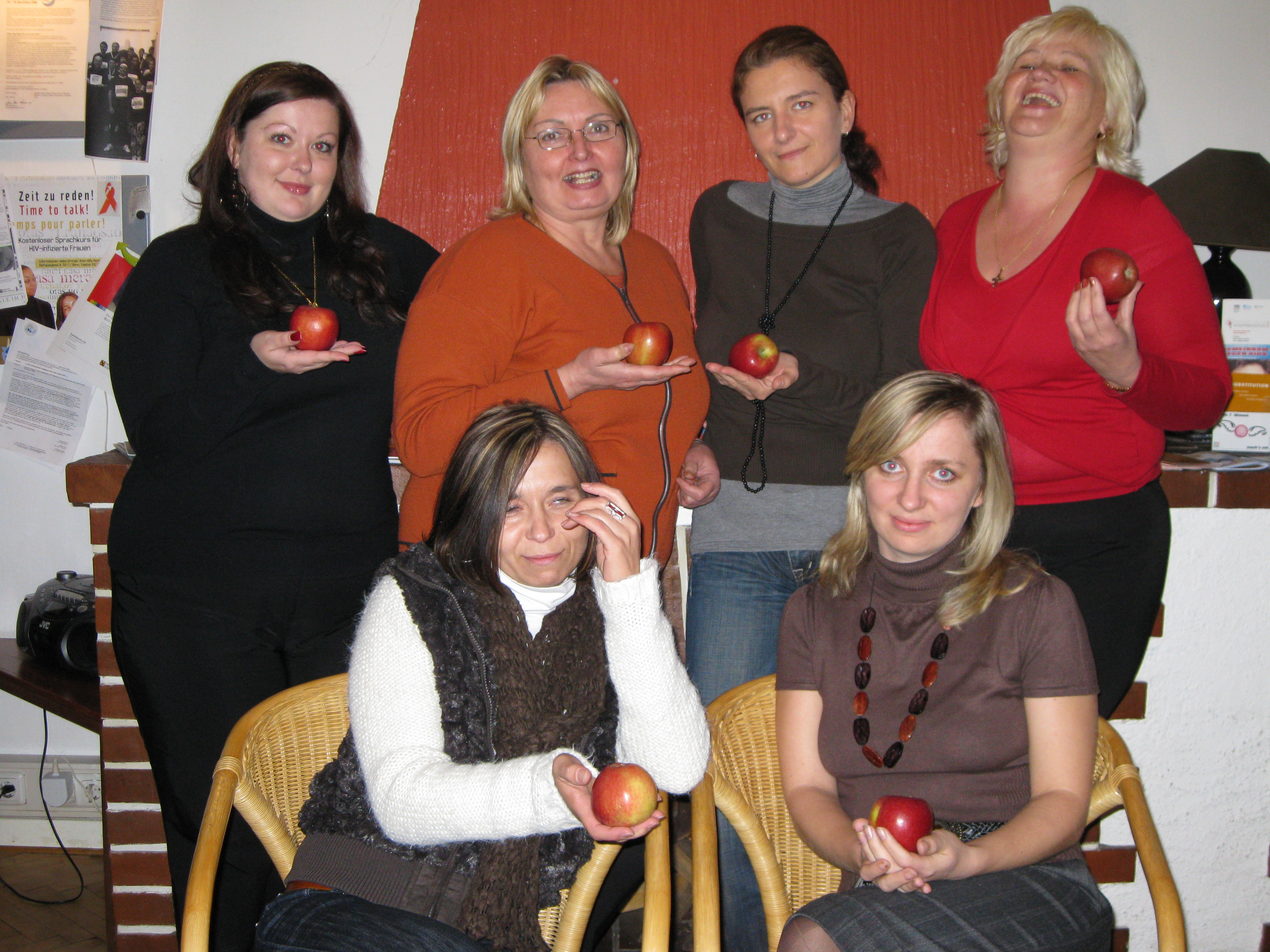 Frauen mit Äpfeln